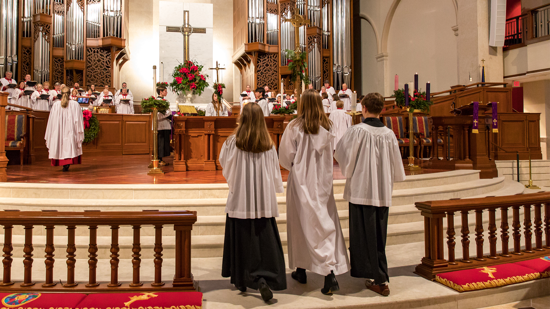Acolytes Processing to the chancel altar of the church.